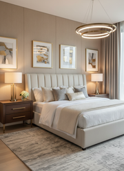 Modern bedroom with a large bed, nightstands, and wall art.