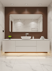 Modern bathroom with white vanity, sink, and large mirror on a brown wall.