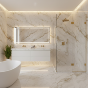 Modern bathroom with marble walls, a shower, and a sink.