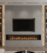 Modern living room with a fireplace and television embedded in a stone wall.