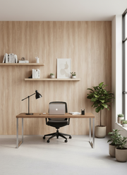 Modern home office with wooden desk, chair, and shelves against a wooden wall.