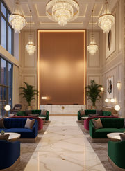 Luxurious hotel lobby with elegant decor, including chandeliers and plush seating.