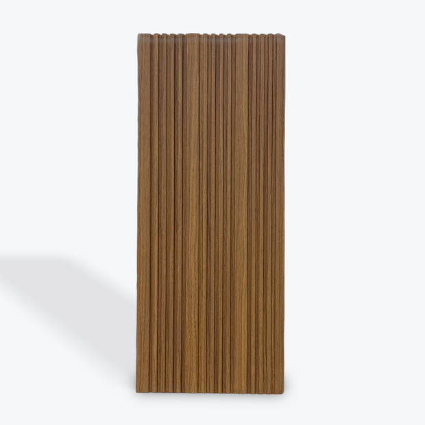 Wooden panel with a ribbed texture on a white background