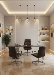 Modern office interior with a desk and chairs in a well-lit room.