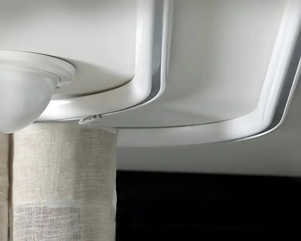 LUXWORLD Series 58 Slimline Curtain Track for curtains and drapes, sleek and minimalist design, mounted on a wall.