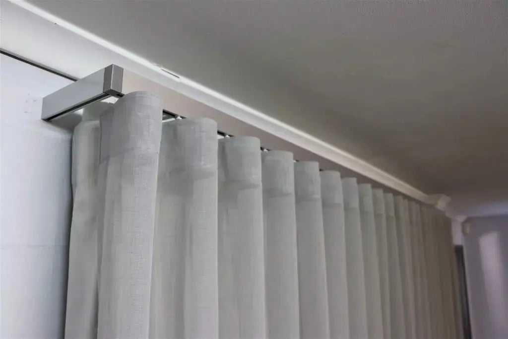 LUXWORLD Series 74 Venice Curtain Tracking system with metal tracks and pulley mechanisms for smooth curtain movement
