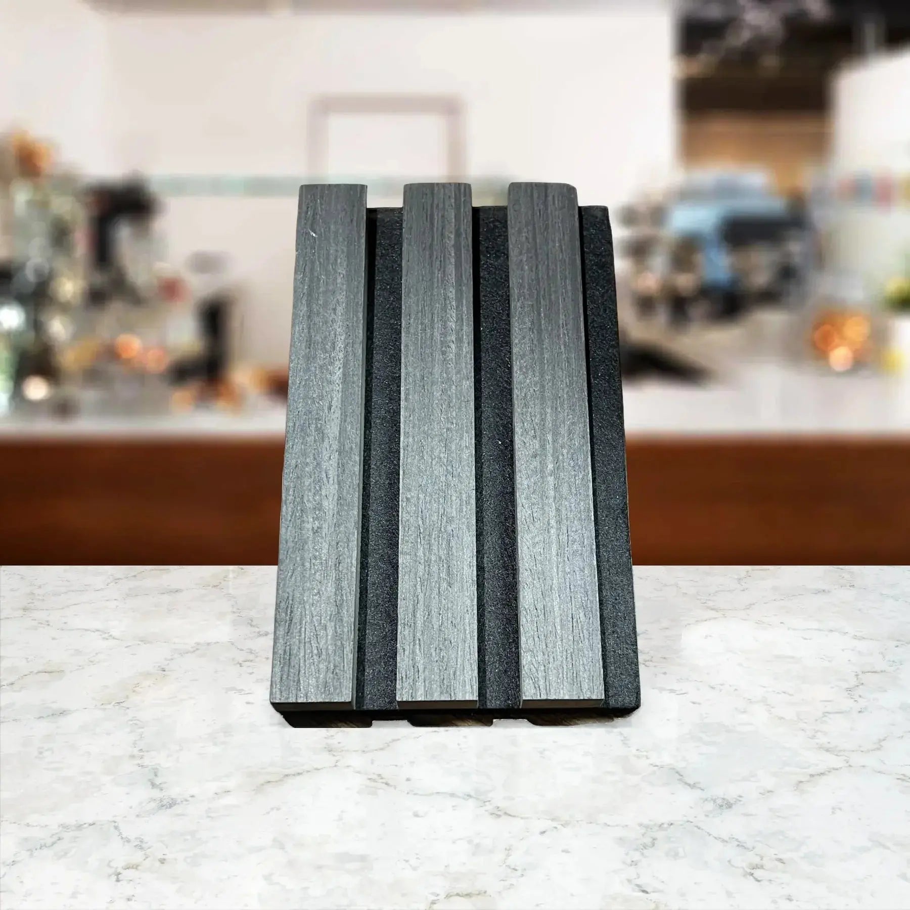 Acoustic wall panels in black oak finish by LUXWORLD, wall cladding for stylish soundproofing, measuring 2700mm x 520mm.
