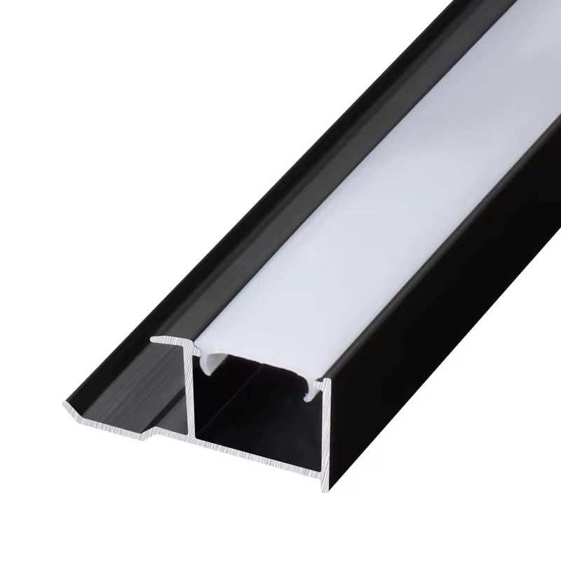 Black aluminum profile for LED strip lights by LUXWORLD, wall cladding design for sleek lighting installations.