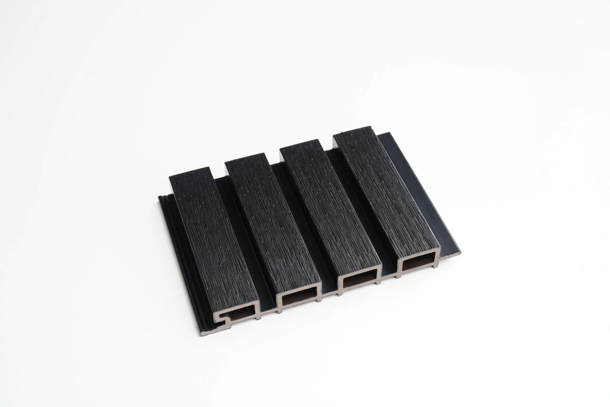 Black outdoor wall panel by LUXWORLD, modern WPC exterior cladding for durable, stylish wall cladding applications.