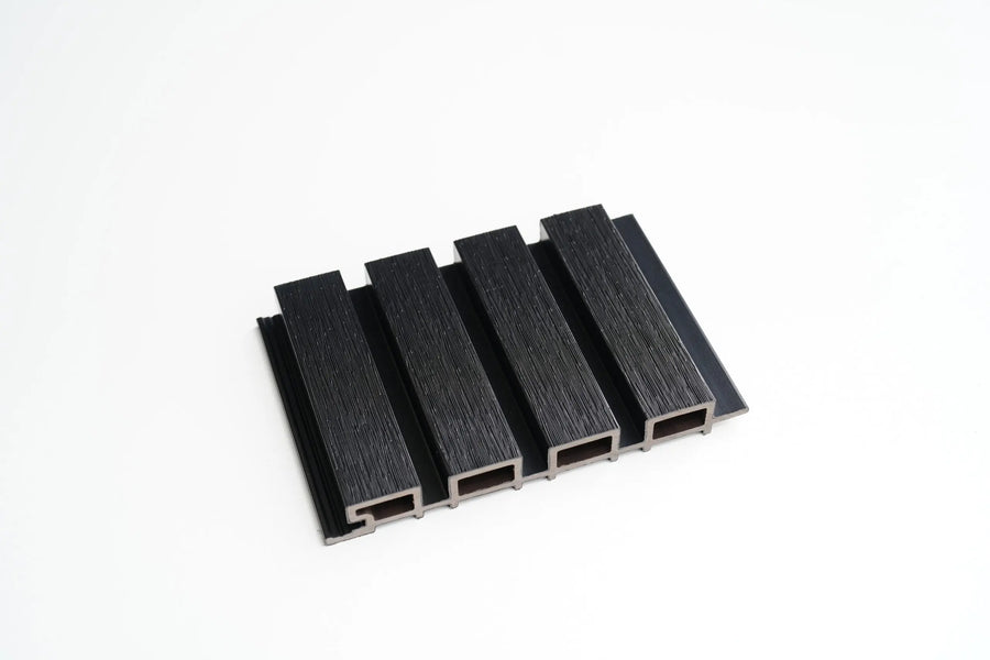 Black outdoor wall panel by LUXWORLD, modern WPC exterior cladding for durable, stylish wall cladding applications.