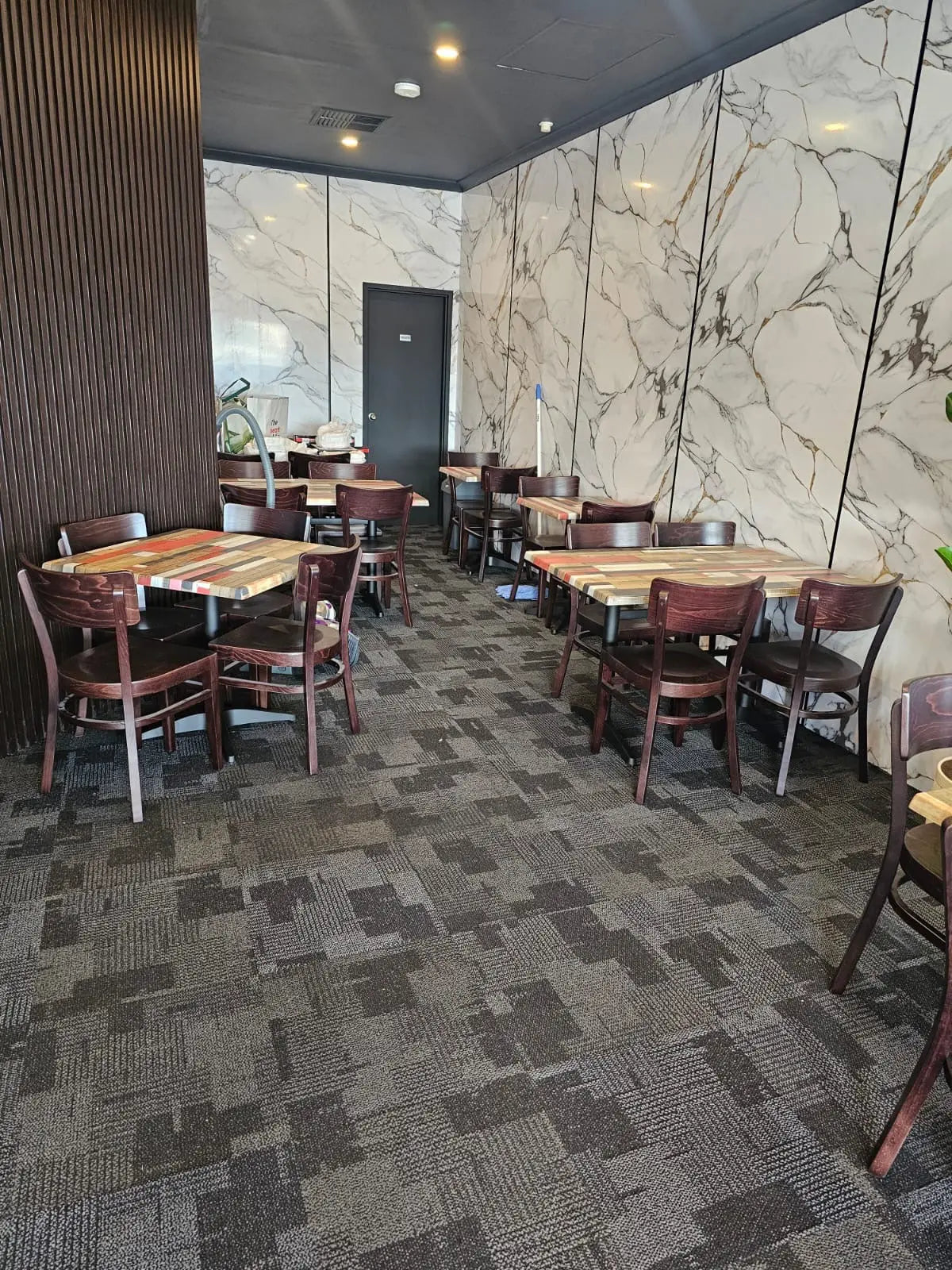 Luxury PVC marble wall panels by LUXWORLD, 1220x2900mm, 5mm thick, used as stylish wall cladding for interior design.