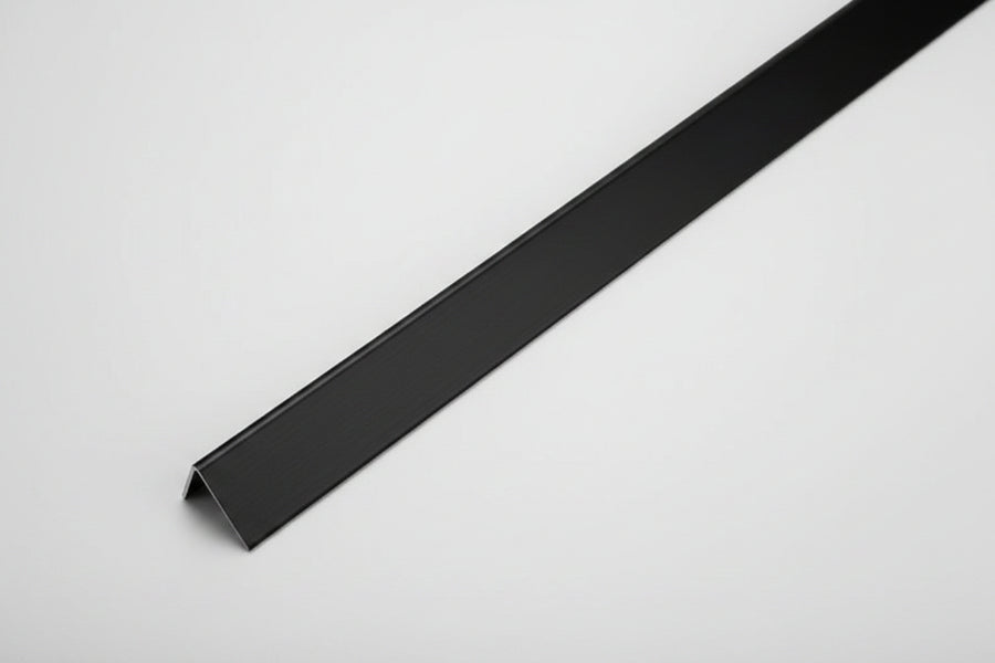 Black aluminium corner angle trim for wall cladding by LUXWORLD, designed for sleek corner finishing and edge protection.