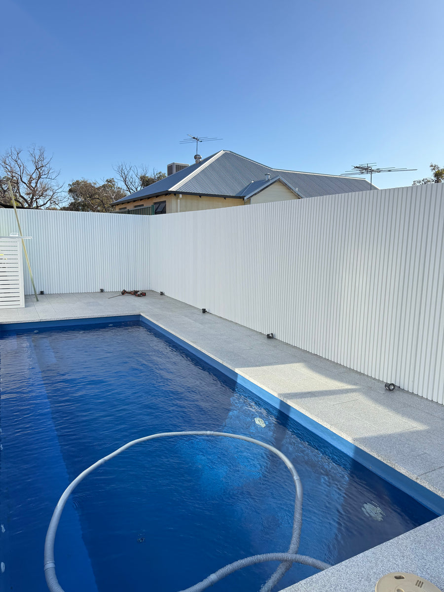 White WPC outdoor wall cladding panel by LUXWORLD, weatherproof exterior wall panel for durable outdoor siding.