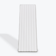 Rectangular white ceramic plate with ribbed texture on a light gray background