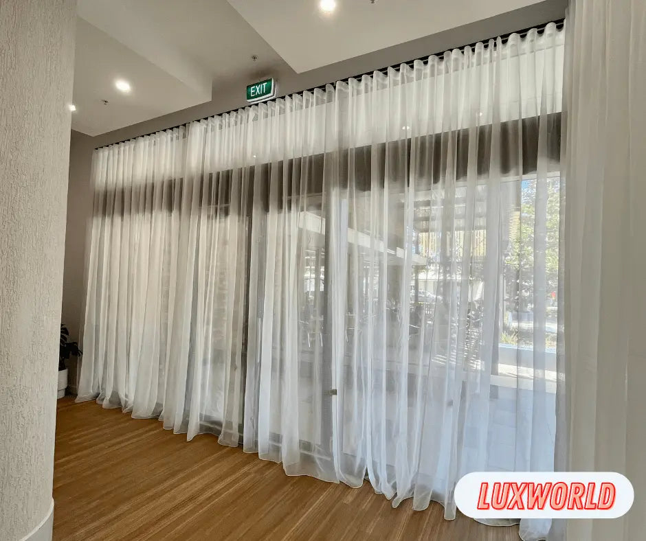 LUXWORLD Series 74 Venice Curtain Tracking system with metal rails and hanging hooks for elegant window curtains.