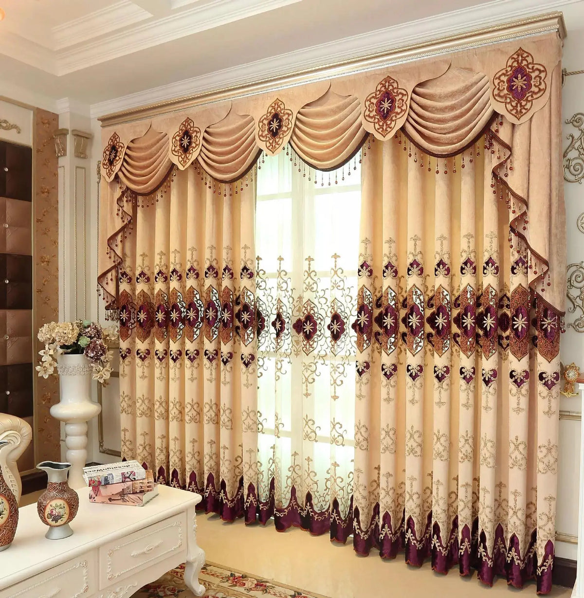 Embroidered sheer curtain layered with a blockout curtain